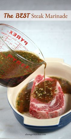 steak marinade being drizzled on top of a piece of meat in a bowl