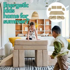 two children playing in the living room with an ottoman and bed for kids to sit on