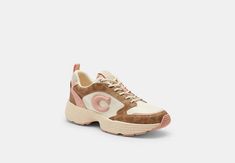 Signature coated canvas leather and mesh upper Fabric lining and footbed Rubber outsole Lace-up closure Style No. CY242 Coach Outlet, Signature Canvas, Canvas Leather, Womens Sneakers, Outlet, Lace Up, Mesh, Women Shoes, Sneakers