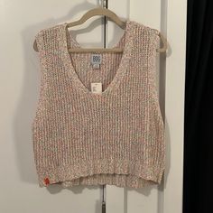 Urban Outfitters Bdg Multi-Color Rainbow Sleeveless Sweater Vest. Size Large. Perfect Condition, Brand New, Never Worn. Pink Cotton Tank Vest, Trendy Cropped Sweater Vest For Spring, Summer Multicolor V-neck Sweater Vest, Trendy Multicolor Vest For Spring, Trendy Pink Vest For Spring, Casual Multicolor V-neck Vest, Casual Multicolor Knit Sweater Vest, Trendy Pink Tank Vest, Trendy Multicolor V-neck Sweater Vest