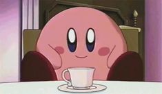 a cartoon character sitting at a table with a coffee cup in front of him and the caption that says, i don't care