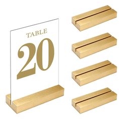 a table number is shown with four place holders and five pieces of wood are arranged around it