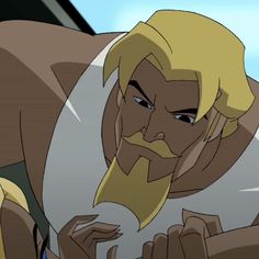 an animated man with blonde hair and a beard is looking at something in his hand