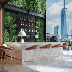 a bar with lots of stools in front of a green wall and cityscape