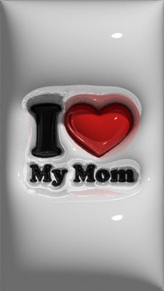 i love my mom sticker on the back of a white car window with a red heart