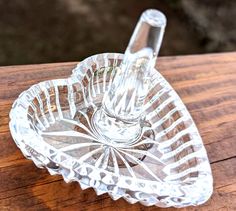 WATERFORD CRYSTAL Heart Shaped Base RING Holder - Signed Retail $100 "Keep your engagement, wedding and decorative rings safe on this stunning crystal Ring Holder, which features a central spike for holding rings, and a heart-shaped base, ridged tray for storing necklaces or earrings. An elegant addition to any desk or vanity." Measures approximately 3" by 2.75" This ring holder is in very good pre-owned condition. There is minor scratching to the bottom - shown in photos.  All my items are from a clean, non-smoking, and cat-free home.  Please read the entire listing and view all photos, enlarged, as I do not accept returns.  Again, please view all photos, enlarged, to see details of condition. I'm happy to answer any questions or take any additional photos you may need to make a purchasin Storing Necklaces, Crystal Ring Holder, Waterford Crystal, Crystal Ring, Crystal Heart, Crystal Rings, I'm Happy, Ring Holder, Engagement Wedding