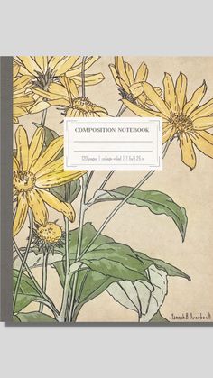 a book with yellow flowers and leaves on the cover, in front of a beige background