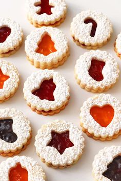 small cookies with jelly in the shape of hearts