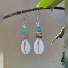 Cute Tropical, Summer, Beach Earrings. Excellent As A Unique Gift For Friends, Sister Wife, Mother, Daughter, Teacher Or Any Lady In Your Life! These Artisan-Made Earrings Perfectly Hang 1.5 Inches. Lightweight And Super Comfortable To Everyday Wear! Details: Materials: Cowrie Shell, Coconut Wood Beads, Turquoise Stone Beads And Surgical Grade Stainless Steel Hook Earrings (Hypoallergenic) All Jewelry Components Are Lead And Nickel Free. Handmade Items. If You Have Any Question Please Feel Free Beach Inspired Jewelry Diy, Diy Cowrie Shell Earrings, Earrings With Shells, Diy Beach Jewelry Ideas, Handmade Beach Jewelry, Handmade Blue Jewelry For Beach Season, Handmade White Beach Jewelry, Handmade White Jewelry For Beach, Handmade Blue Beaded Earrings For Beach