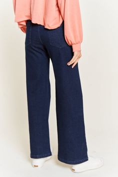 Elevate your denim game with our High Waisted Button Jeans, designed to blend style and comfort effortlessly. Made from a stretch denim fabric, these jeans offer a flattering fit with their high waist and exposed button front, while the elasticized waistband at the back ensures ease of wear. The wide-leg design adds a touch of retro-inspired chic, making these jeans a versatile choice for any occasion, from casual outings to polished events. Material & Care: Material: SELF: 90%COTTON-10%POLYESTE Cuffed Denim Shorts, Midi Sundress, Comfortable Jeans, Ribbed Bodysuit, Clothing Labels, Plus Size Swimwear, Wide Leg Denim, Sweater Blouse, High Waisted Denim