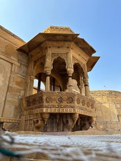 an ornate stone structure with intricate carvings on it