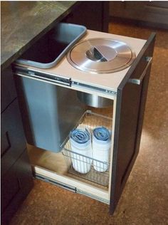 an open cabinet with some items in it