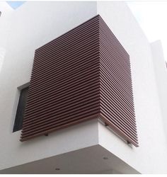 a close up view of a building's vertical slats