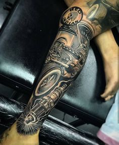 a man's leg with a tattoo on it