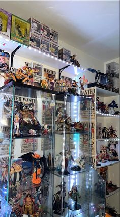 a display case filled with lots of toys and collectibles on top of shelves