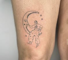 a person with a tattoo on their leg