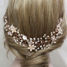 Wedding hair vine/back headpiece   Colour:  copper/rose gold /clear/ivory With loops for bobby pins (hair pins NOT included!) Measurements: approx  9.5 x 1.5 inches (please note  not  long) Materials:  metal leaves and flowers, clear crystal rhinestones, ivory faux pearls, copper wire . This listing for one hair vine  in copper/rose gold  tone (silver tone  or gold hair vine  available in other listing). Great for wedding or other celebration. MORE ACCESSORIES: https://www.etsy.com/uk/shop/BridalArtDeco?ref=listing-shop-header-item-count&section_id=23918122 Please note some images have been enlarged to allow for details to be shown. Read the descriptions for details on actual size of each item. In all my shop listings I have made every effort to ensure that the images match the item as clo Headpiece Wedding Hair, Gold Hair Vine, Bobby Pin Hairstyles, Gorgeous Hairstyles, Wedding Hair Piece, Vine Wedding, Rose Gold Bridal, Bridal Hair Vine, Hair Jewelry Wedding