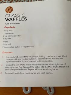 a recipe for classic waffles is shown on a table with a wire rack