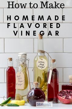 bottles of homemade flavored vinegar and pomegranate with the words how to make homemade flavored vinegar