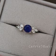 Beautiful lapis lazuli leaf design ring, nature inspired ring, understated blue color with a little gold inside, unique gift. Main Ring: Material: 925 sterling silver, plated with white gold, can also customize with solid gold. Main Stone: 6mm lapis lazuli Side Stone: CZ Band Width: Approximately 1.7mm CS0414 Main stone can be different gems, please contact for a custom request; Can also customize with solid gold; Most sizes can ship soon, if need other size, please contact me; Ship by express s Lapis Lazuli Rings Women, Lapis Lazuli Ring Silver, Nature-inspired Blue Jewelry For Wedding, Blue Nature-inspired Jewelry For Wedding, Nature-inspired Blue Jewelry For Weddings, Nature-inspired Blue Ring Jewelry, Blue Nature-inspired Jewelry Ring, Lapiz Lazuli Ring, Lapis Lazuli Engagement Ring