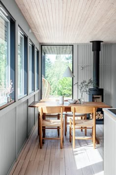 a wooden table sitting in the middle of a room