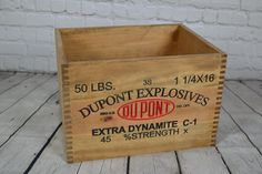 an old wooden box that has been used as a storage container for doughnuts