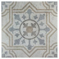 an artistic tile design in grey and white with a circular center medallion on the middle