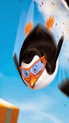 an animated penguin flying through the air with his feet in the air and wearing goggles