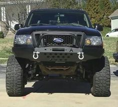 the front end of a black pickup truck