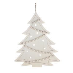 a white wooden christmas tree hanging from a string