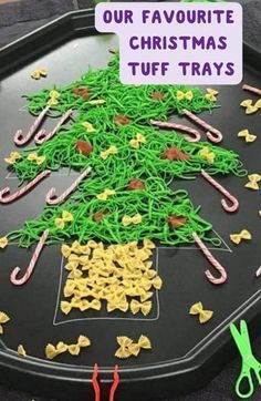 a christmas tree made out of crochet on a tray with scissors and string