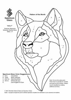 the wolf's head is shown in black and white, with numbers on it