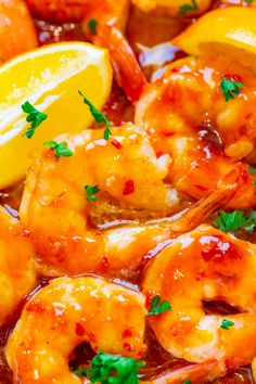 closeup of cooked shrimp with lemon and parsley