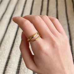 ---FIVE SENSES DESIGN RING--- ︳Material: Stainless Steel  ︳Finish: 925 Sterling Silver / 18K Gold  ︳Ring Size: US 5 (49mm) / US 6 (52mm) / US 7 (54mm)  ︳Every jewelry is custom made by hand with sincere love and warm heart in our shop 😊 ------------------------------------------- HOW ＊ TO ＊ORDER＊ FIVE SENSES DESIGN ① Choose Primary Color > Silver / Gold  ② Choose Ring Size > US 5 / US 6 / US 7 ③ Click Add to Cart ④ Receive lovely Five Senses Designer Ring HOW＊ TO ＊PRESERVE ＊ FIVE SENSES DESIGN ︳ Keep it dry and clean; ︳ Remove it before going to bed; ︳ Use perfume or lotion before wearing it; ︳ Put it on after you change clothes; ︳ Avoid it in course of excessive sweating; ︳ Store it properly; ︳ Avoid wearing it at Spa or Pool; ︳ Wear it after hair spray and makeup; ︳ Avoid chores like la Urban Jewelry, Retro Minimalist, Layered Rings, Gold Color Ring, Stainless Steel Plate, 18k Gold Ring, Plated Ring, Finger Ring, Open Ring