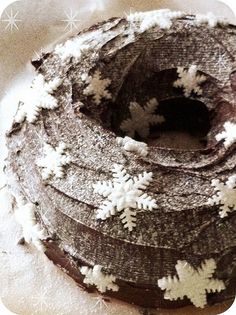 a cake with white snow flakes on it