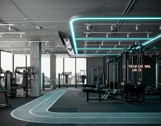 an empty gym with neon lights on the ceiling and treadmills in the foreground