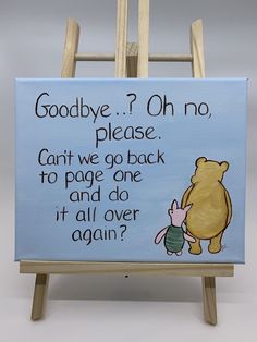 a wooden easel with a sign on it that says goodbye 2 oh no please can't we go back to page one and do it all over again again again again again?