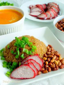 a white plate topped with meat and veggies next to bowls of sauces