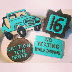 three decorated cookies with numbers and cars on them, one is for texting while the other is driving