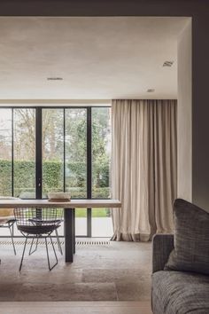 the dining room is very large and has sliding glass doors to let in natural light