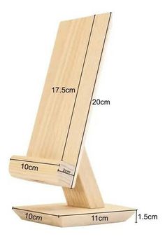 a wooden phone stand with measurements