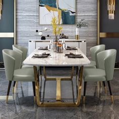 a dining room table with four chairs and a large painting on the wall behind it