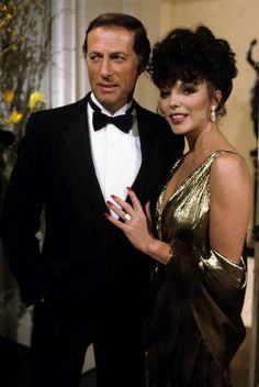 a man in a tuxedo standing next to a woman wearing a gold dress