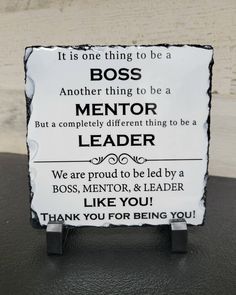 a sign that says it is one thing to be a boss and another thing to be a mentor leader