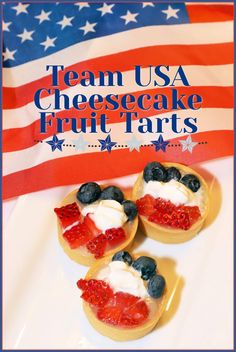 three mini american cheesecakes on a plate with an american flag in the background