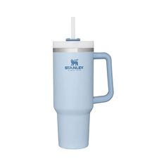 a blue travel mug with a straw sticking out of it