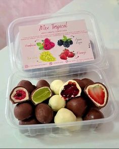 a plastic container filled with chocolate covered fruit