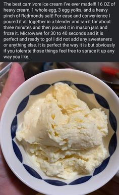 a bowl filled with ice cream sitting on top of a table