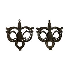 pair of antique cast iron wall sconces