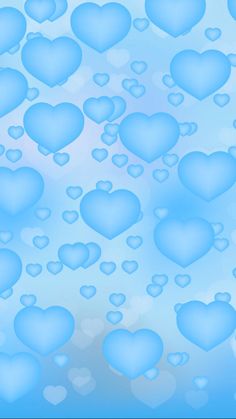 many blue hearts floating in the air on a light blue background with white circles and bubbles